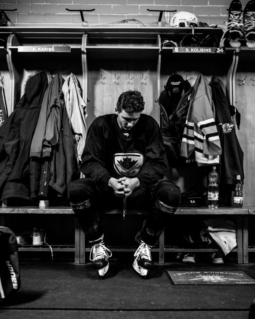 Ice hockey player in locker room